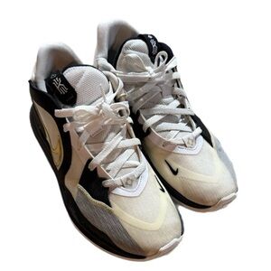 Nike Kyrie Low 5 men’s 10 sneakers in a cream, black, and metallic gold color.